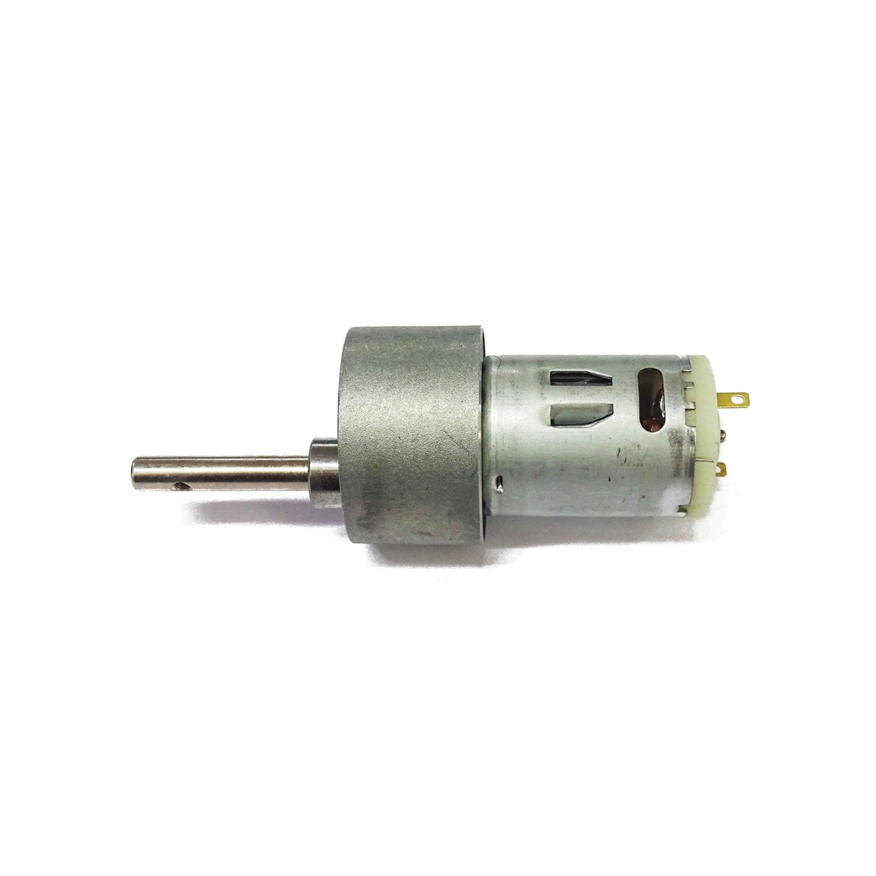 Top-down photo of a BTS7960 43 A dual half-bridge motor driver with heatsink and green screw terminals.